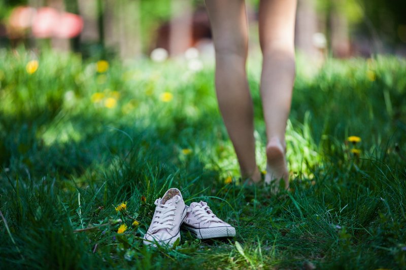Barefoot on grass - leave shoes behind